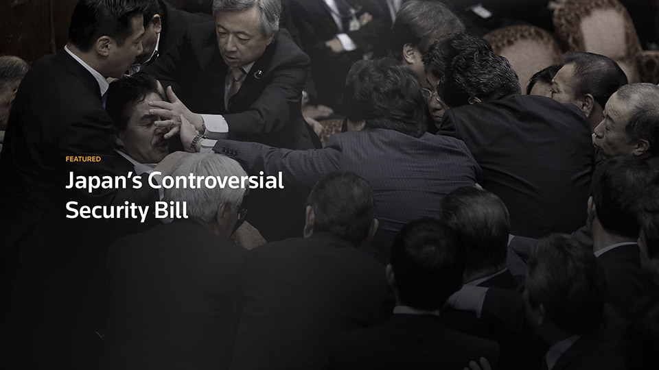 Featured story card reading Japan's Controversial Security Bill over a press scrum photo